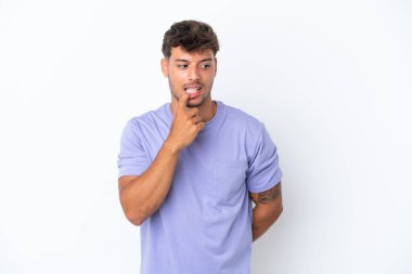 Young caucasian handsome man isolated on white background nervous and scared