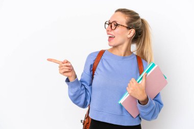 Young student caucasian woman isolated on white background pointing finger to the side and presenting a product