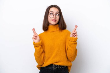 Genç Ukraynalı kadın beyaz arka planda izole edilmiş, şans diliyor ve en iyisini diliyor.