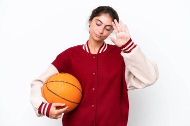 Young basketball player woman isolated on white background making stop gesture and disappointed