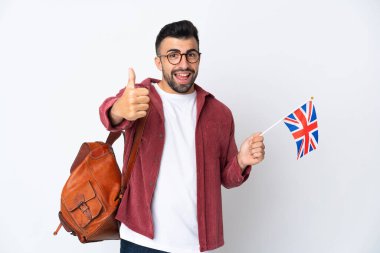 Birleşik Krallık bayrağını tutan genç İspanyol bir adam. Çünkü iyi bir şey oldu.