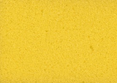 Sarı doğal sünger dokusunu kapat. Soyut gözenekli arkaplan.