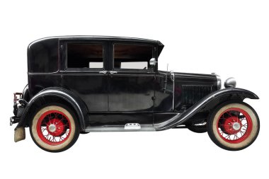 Yirminci yüzyılın başlarında siyah lüks klasik bir arabanın yan görüntüsü.