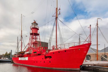 Den Helder, The Netherlands - November 11, 2021: Old lighthouse boat in the harbor of Den Helder, The Netherlands clipart