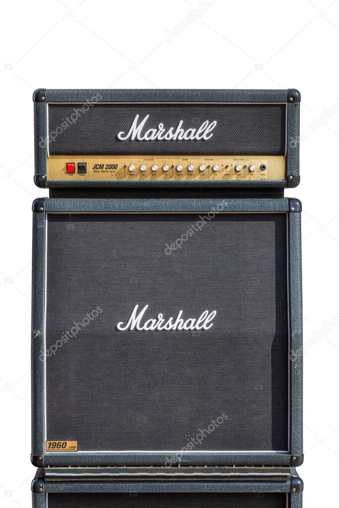 Dokkum, The Netherlands - December 18, 2023: Big Marshall guitar amplifier speaker cabinet and control head in Dokkum, The Netherlands