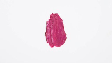 Beyaz arka planda pembe poz. Yakın plan. Üst Manzara. Boşluğu kopyala.