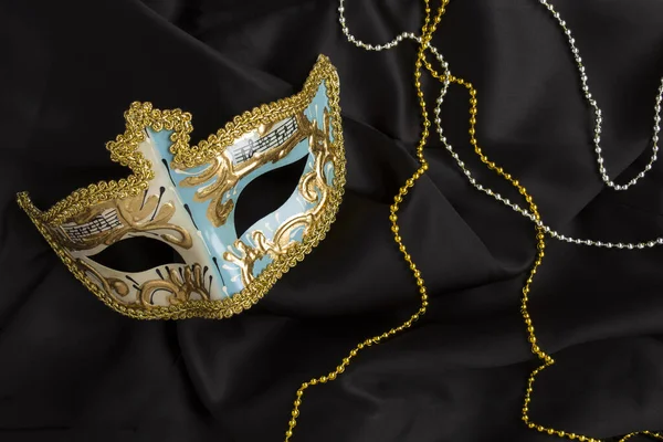 Kerst Carnaval Masker Zwarte Textiel Achtergrond Bovenaanzicht Close — Stockfoto