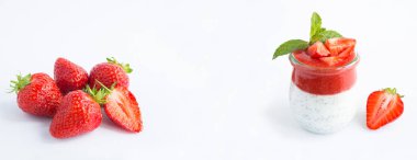 Pudding with chia seed and strawberry on the white background. Copy space. Close-up.