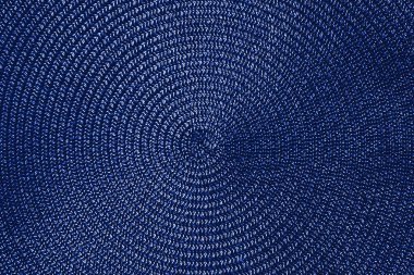 Blue wicker background. Copy space. Close-up.