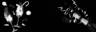 Noel kompozisyonu. Siyah arka planda konfeti olan bir şişe şampanya ve şarap bardağı. Üst Manzara. Boşluğu kopyala.