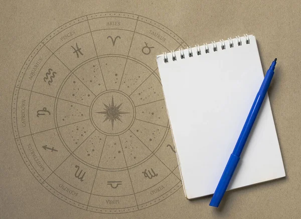 Notepad Pen Drawing Zodiac Sign — Stock Photo, Image