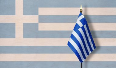 Yunan masaüstü bayrağı, bayrağın soluk bir görüntüsüne karşı