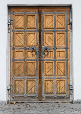 Antique doors in an old building  clipart