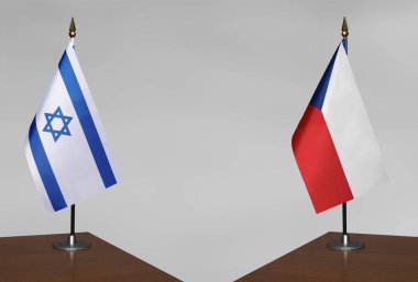 İsrail ve Çek Cumhuriyeti 'nin bayrakları gri arka planda duruyor