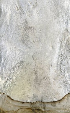 Doğal taş dokusunu kapat. Yüksek çözünürlüklü. Tam kare. Tasarım için soyut arkaplan ve doku. Fosilleşmiş kaya. Erimiş gümüş külçe, beyaz metal.