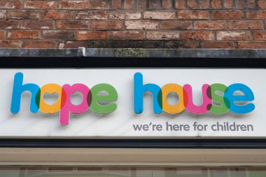 Chester. Cheshire, United Kingdom - 20 March 2024 : Sign outside the hope house charity second hand shop in Chester clipart