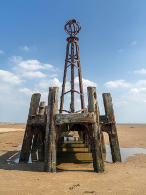 the remains of the wooden landing jetty which used to be at the end of St Annes Pier in Lancashire which was used for steam boat services from Blackpool and Liverpool clipart