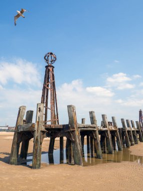 the remains of the wooden landing jetty which used to be at the end of St Annes Pier in Lancashire which was used for steam boat services from Blackpool and Liverpool clipart