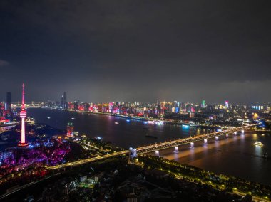 Night view of the landmark city on the two rivers and four banks of Wuhan, China clipart