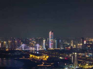 Night view of the landmark city on the two rivers and four banks of Wuhan, China clipart