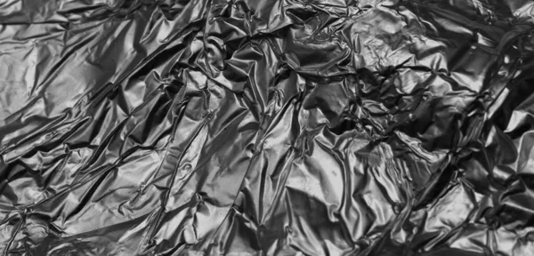 Black Crinkle Foil Visible Details Background — Stock Photo, Image