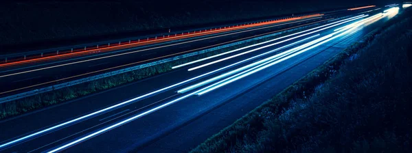 stock image lights of cars with night. long exposure