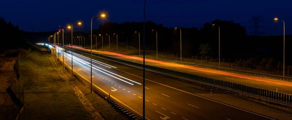 stock image lights of cars with night. long exposure