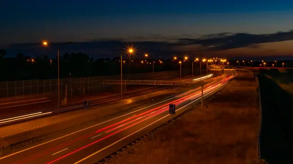 stock image lights of cars with night. long exposure