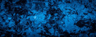 blue ash from burnt wood with visible texture