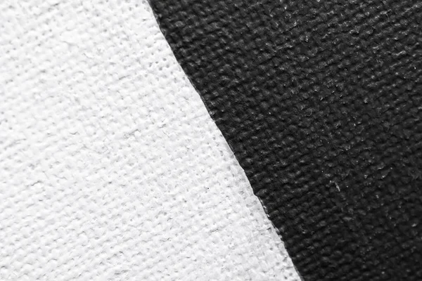 white canvas painted with white and black paint