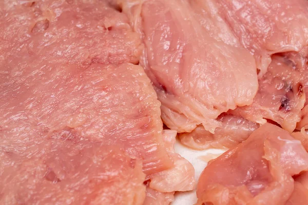 pink chicken breast meat. background or texture