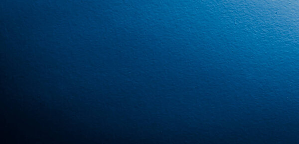 scratched blue metal sheet with visible texture. background