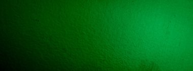 Görünür desenli yeşil metal bir levha çizilmiş. arkaplan