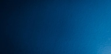 Görünür desenli mavi metal bir levha çizilmiş. arkaplan