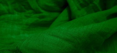 Yeşil kırışık pamuklu kumaş ve görünür detaylar. arkaplan