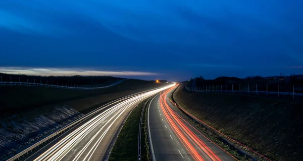 stock image lights of cars driving at night. long exposure