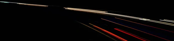 夜の車のライト 長時間露光 — ストック写真