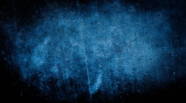 İlginç bir deseni olan mavi boyayla boyanmış duvar.