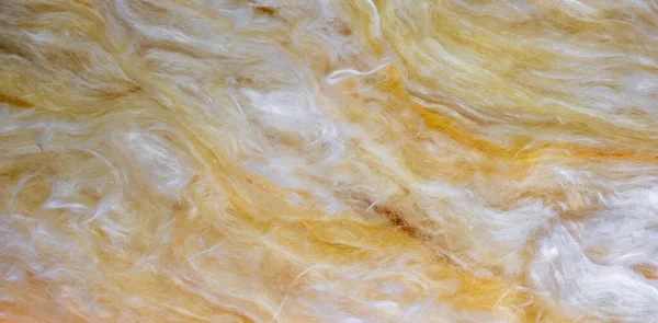 stock image yellow mineral wool with a visible texture