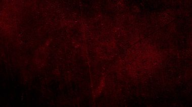 İlginç bir deseni olan kırmızı boyayla boyanmış duvar.