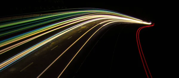 Stock image lights of cars driving at night. long exposure