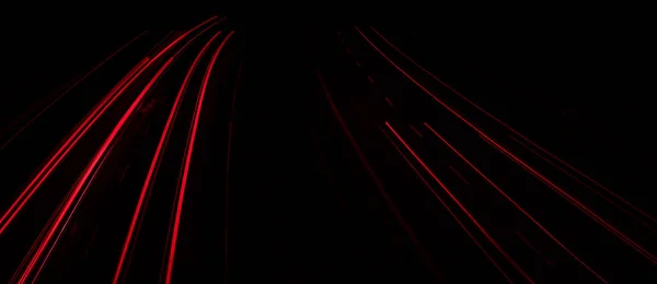 stock image lights of cars driving at night. long exposure