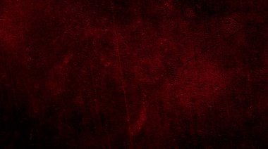 İlginç bir deseni olan kırmızı boyayla boyanmış duvar.