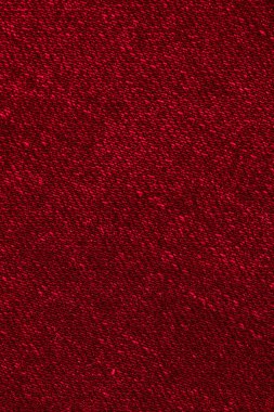 Görünürde ilginç bir dokusu olan kırmızı kot pantolon. arkaplan