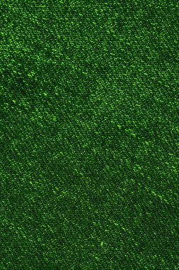 Görünürde ilginç bir dokusu olan yeşil kot pantolon. arkaplan