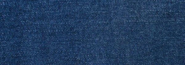 Blauwe Jeans Met Een Interessante Textuur Zichtbaar Achtergrond — Stockfoto