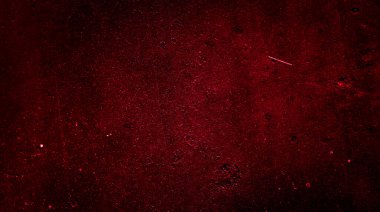 İlginç bir deseni olan kırmızı boyayla boyanmış duvar.