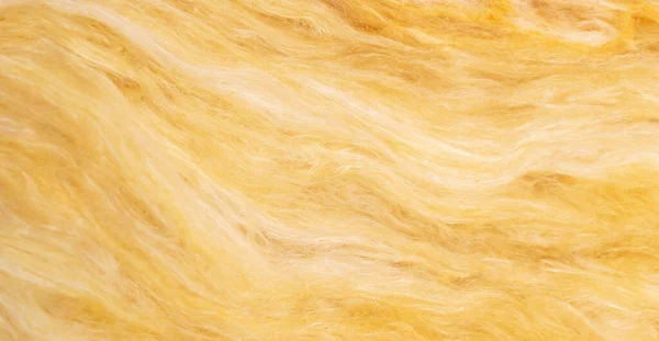 stock image yellow mineral wool with a visible texture