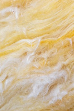 Görünür desenli sarı mineral yünü.