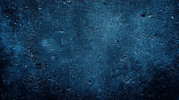 stock image wall painted with blue paint with an interesting texture